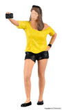 Viessmann - 1551 -  eMotion Woman Snaps Selfie - with Flashlight (HO Scale)