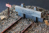 Uneek - UN-543 - Timber Buffer in Pile of Ballast (HO Scale)